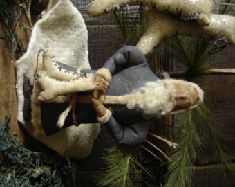 Primitive Folk Art Santa with Skates Ornament