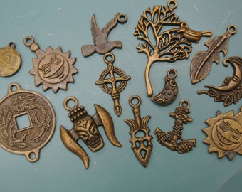 Lot of 13 mixed collection vintage 1980s unused antiqued brontzcolor metal pendants w different motives and sizes for your jewelry prodjects