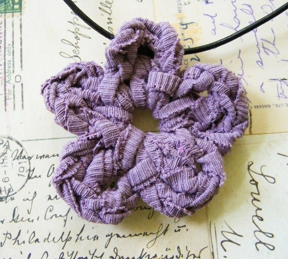 Crocheted Mauve T-Shirt Yarn Flower Pendant on Black Leather Choker