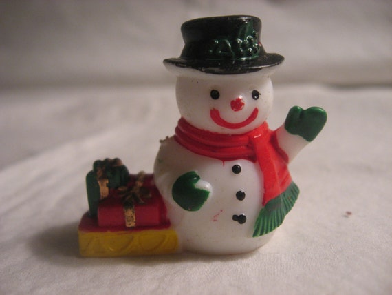 small plastic snowman figurines