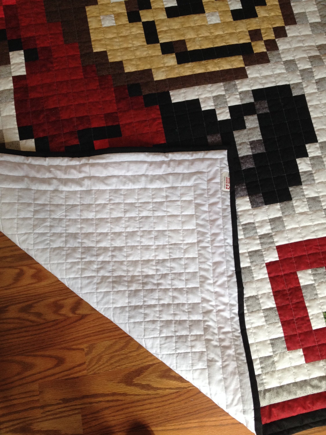 osu-buckeye-ohio-state-8-bit-brutus-buckeye-quilt-throw-sized