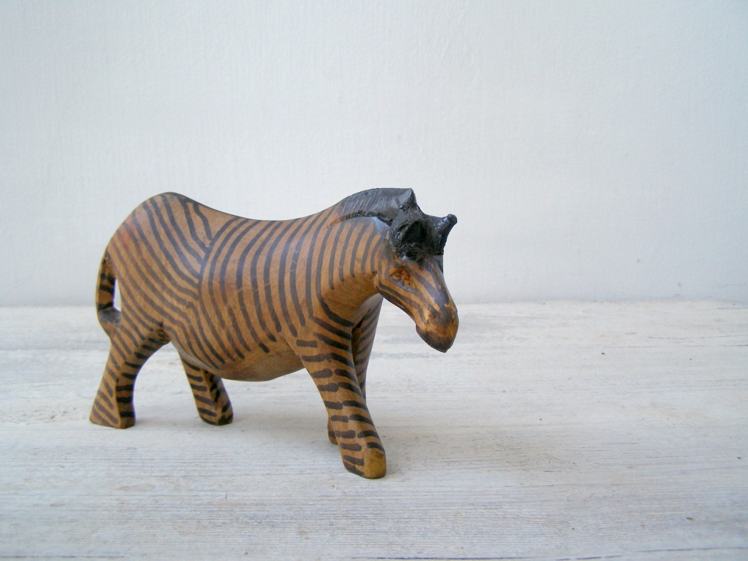 tall wooden zebra statues