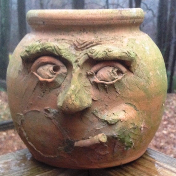 pottery faces garden