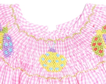 Smocked summer dress with large colorful bugs