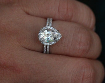 wedding band with pear engagement ring