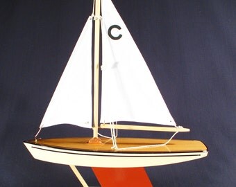 Pond Yacht model sailboat that actu ally sails. Crafted from wood