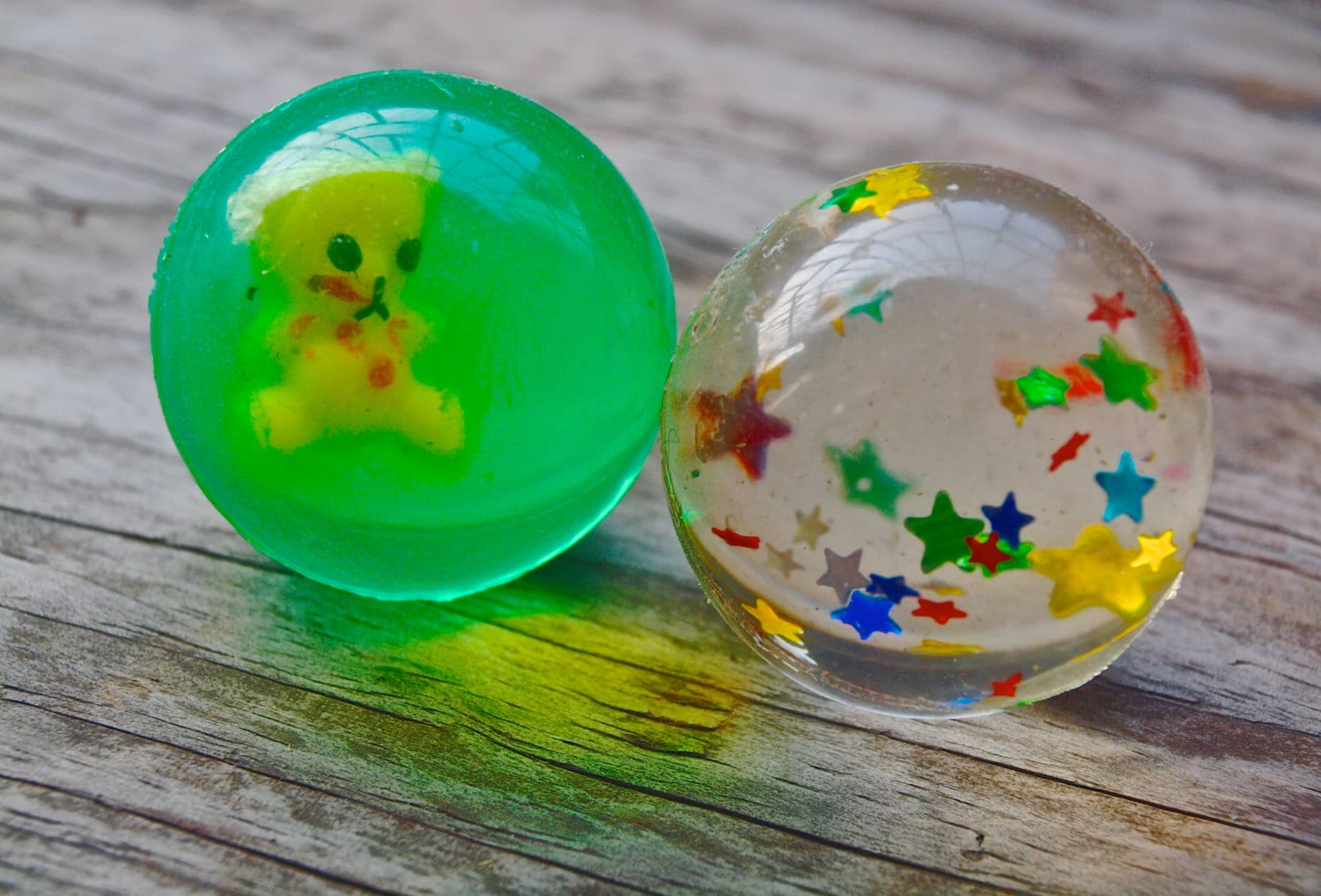 Vintage resin rubber bouncy balls ketchup bear and stars