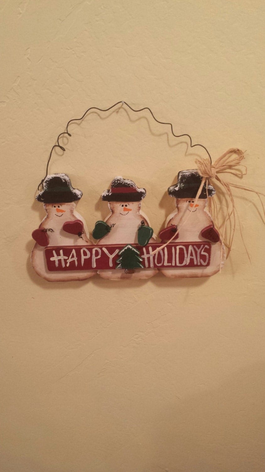 happy holidays snowmen sign