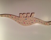 wooden dinosaur alphabet puzzle