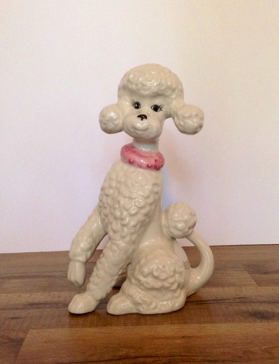 white ceramic poodle