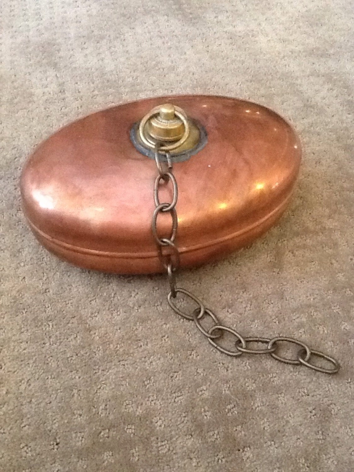 Copper antique bed warmer used to keep feet warm by