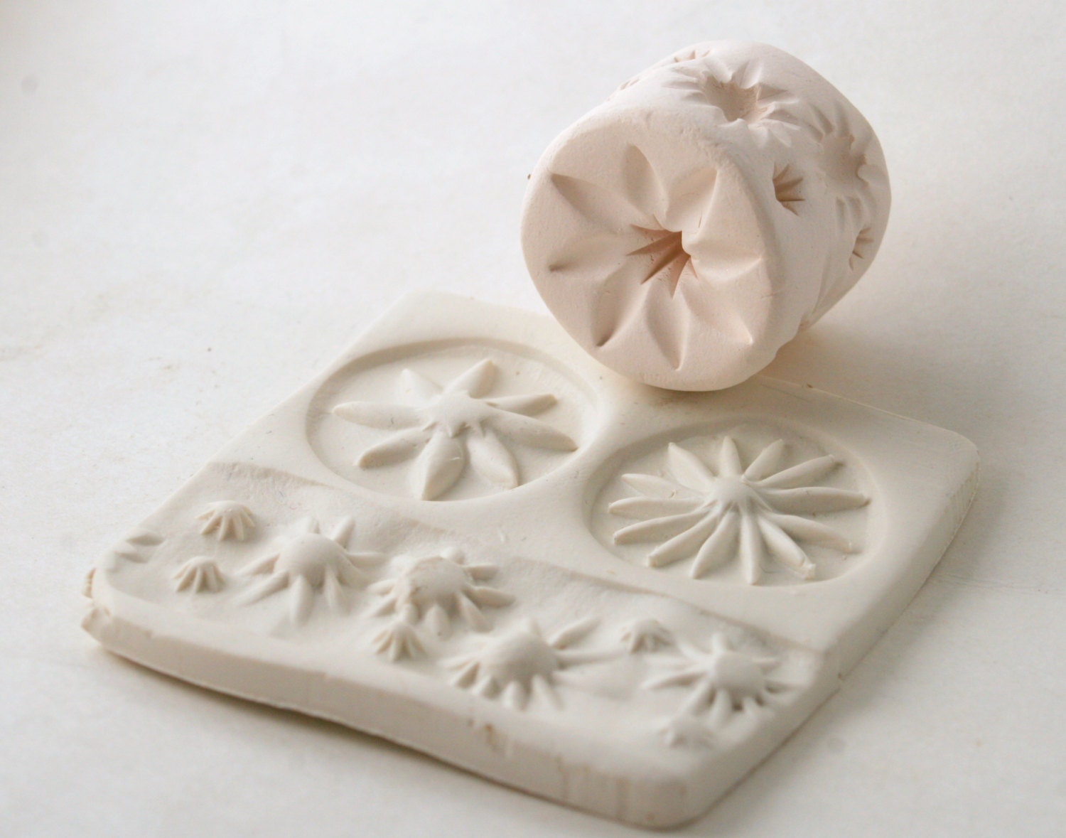 Clay Roller Stamp MultiSided Flowers and Star Bursts