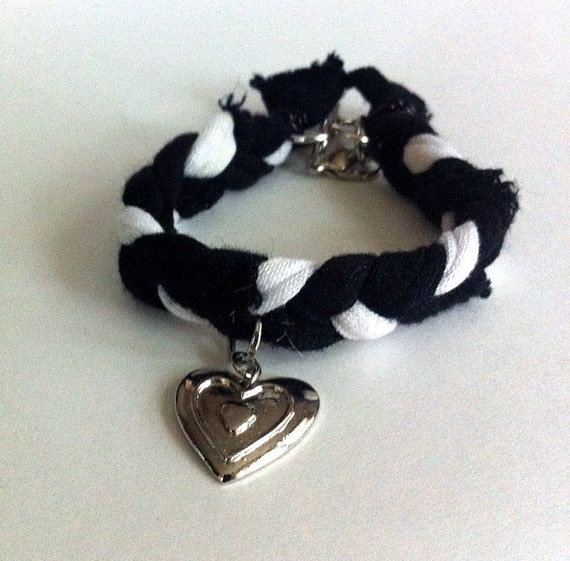 Items similar to Black and white braided friendship bracelet with