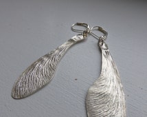 Popular items for seed pod earrings on Etsy