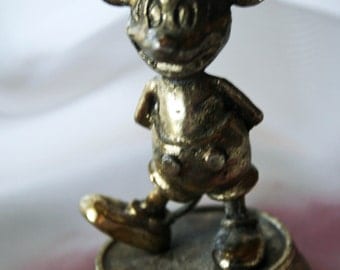 gold mickey mouse statue