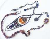 Warrior Woman. Cosmic rustic Victorian tribal assemblage iridescent necklace.