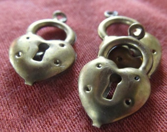 1cm textured bronze tone keyhole heart beads- 3 quantity