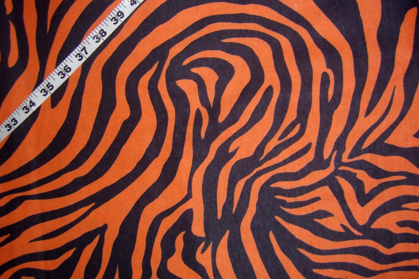 Flannel fabric zebra Tiger stipes black on orange cotton print