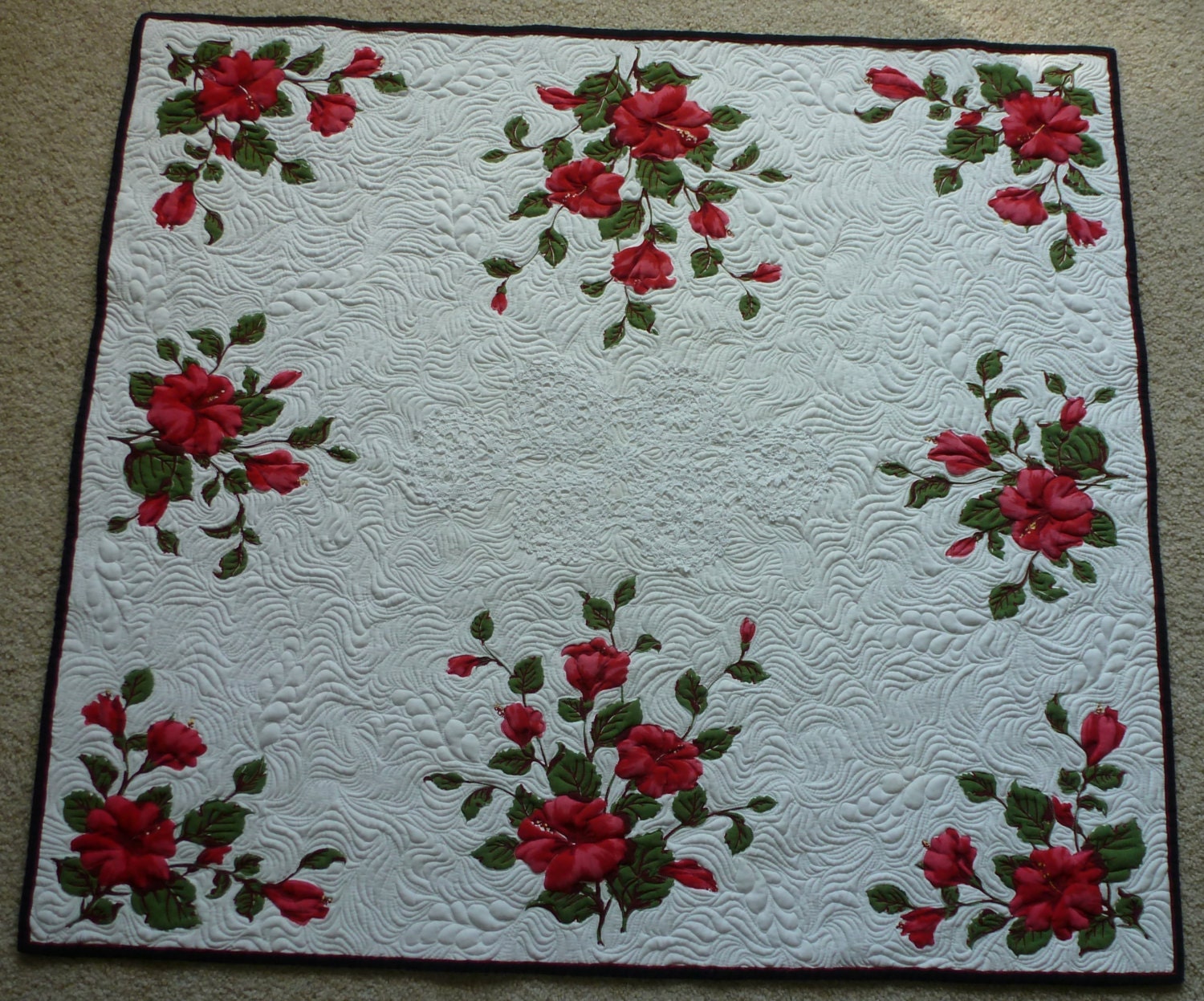 Heirloom quilted Vintage Tablecloth featuring beautiful red