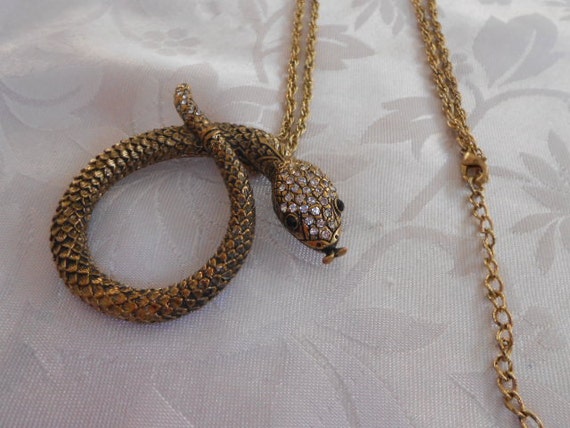 Vintage coiled snake pendant bronze and crystal by denise5960