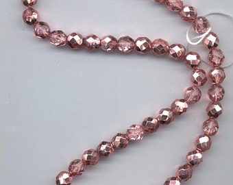 One 16-inch strand (about 50 beads) 8 mm crystal/metallic pink apricot firepolished Czech beads - lot 877