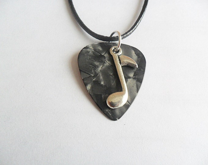 Gray guitar pick necklace with music note charm that is adjustable from 18" to 20"