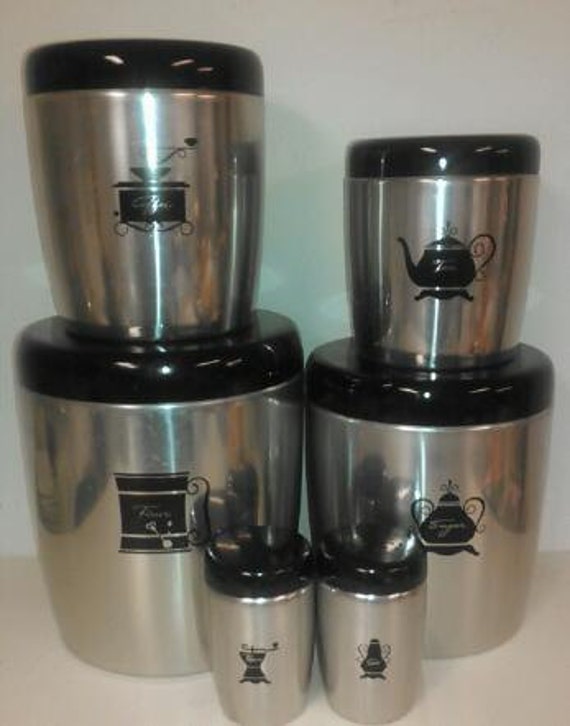 Six Piece Set of Vintage West Bend Silver Canisters with