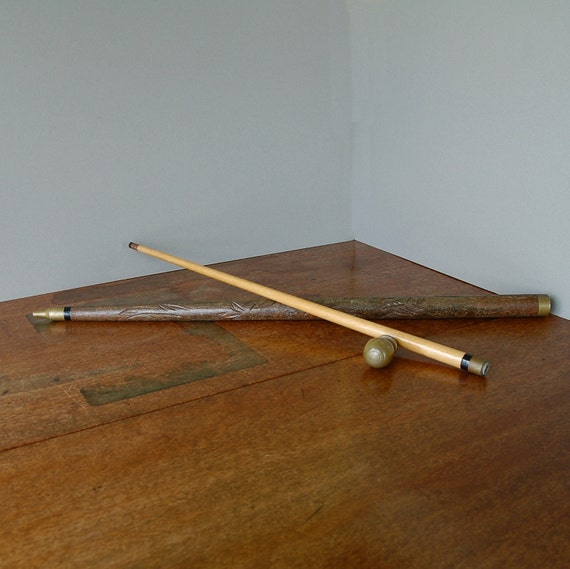 Vintage carved wooden walking stick with hidden pool or