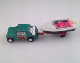 Vintage tootsie toys jeep trailer and boat