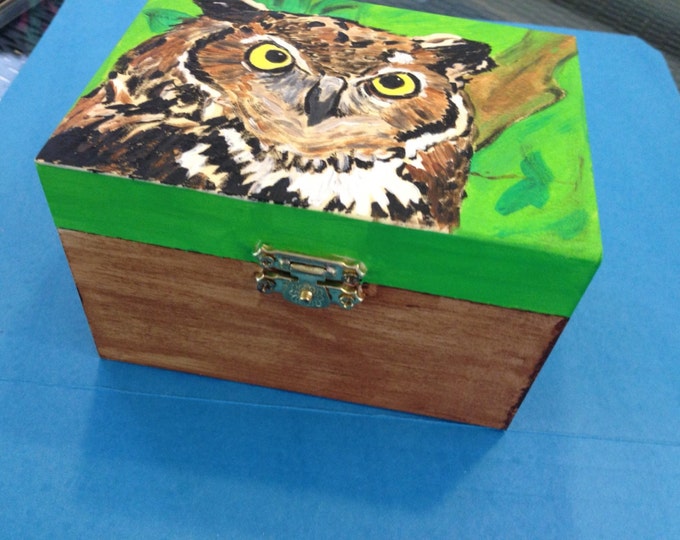 Solid Wood box, with front latch and hinges. Great Horned Owl painted in acrylics on top.