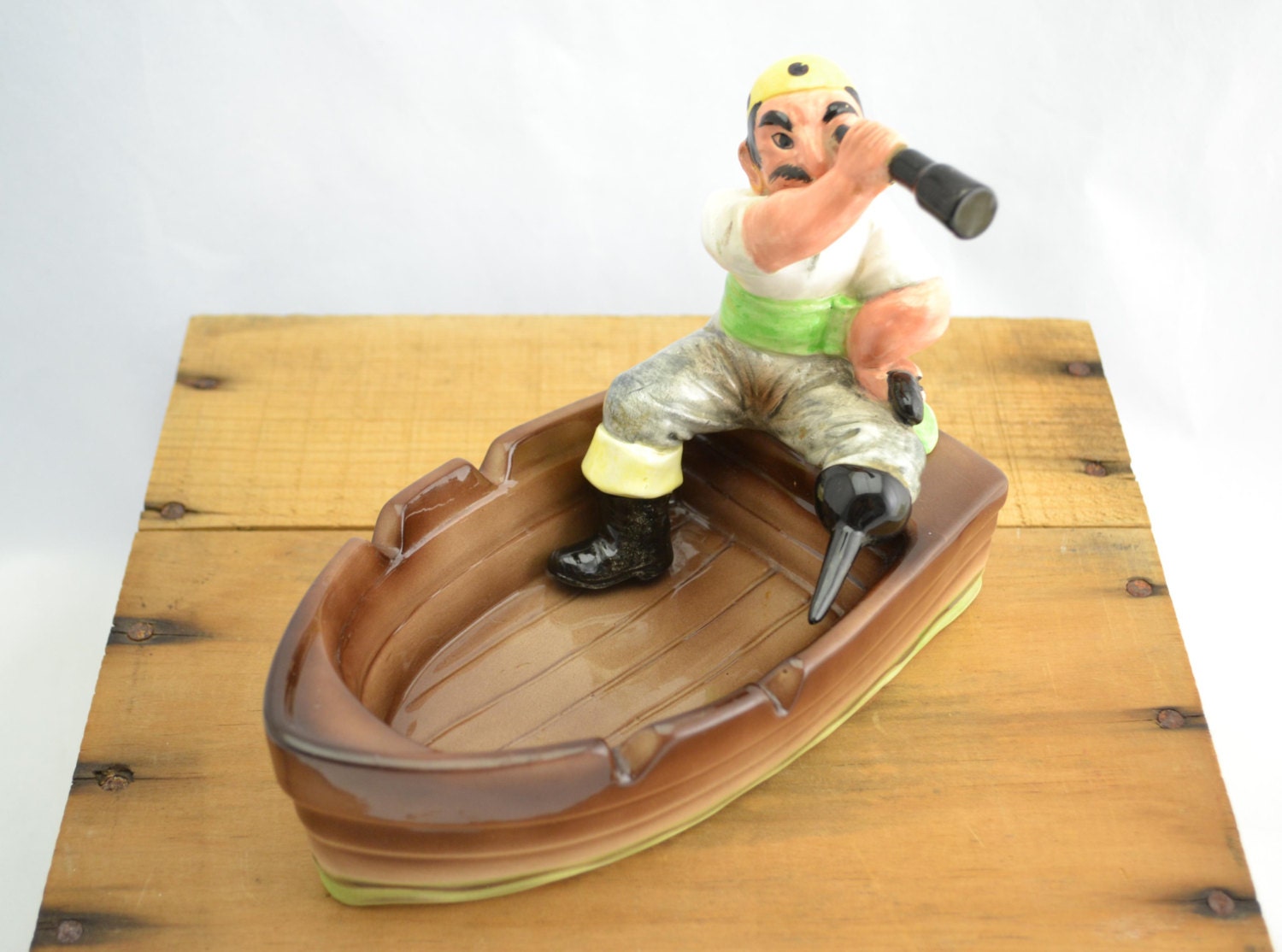 Vintage 1960s Ashtray Pirate Looking through a Spyglass while