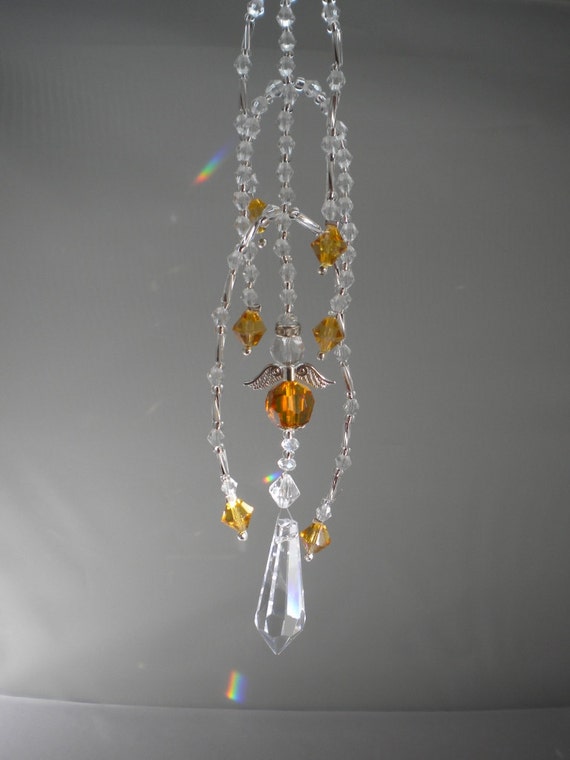 Crystal Suncatcher with golden angelClear crystal teardrop