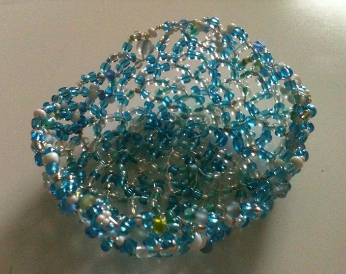 beaded mostly blue and white wire basket