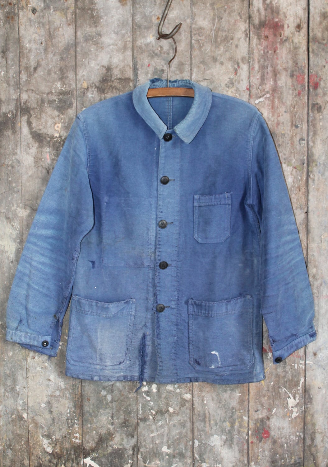 Vintage 1950s blue worn out sun-faded blue french work shirt