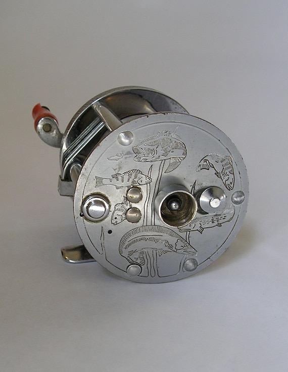 Vintage J.C. Higgins Casting Reel Engraved 7 Fish Model