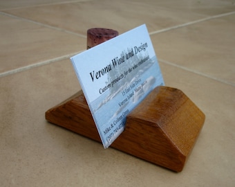 Business card holder. Cork is interchangeable. Dimensions will vary based on barrel stave width (typically 2-3" wide).