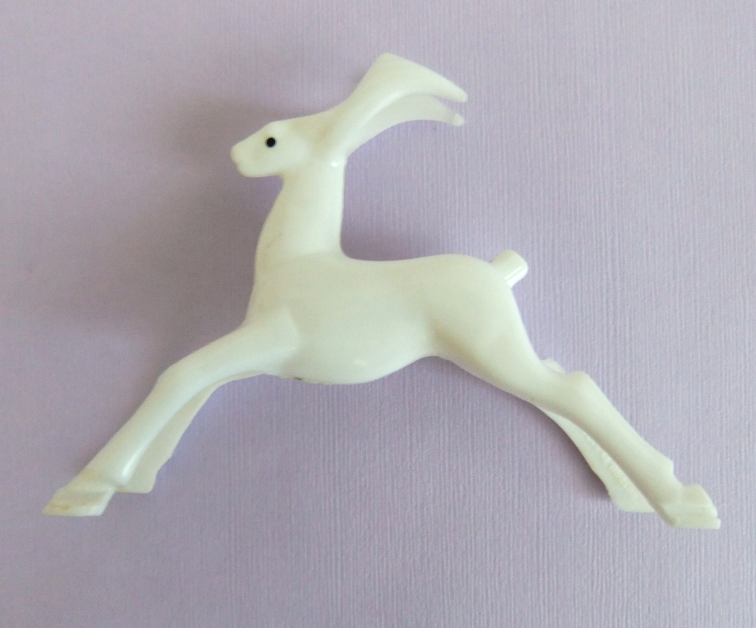 plastic deer figurine