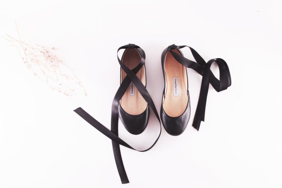 black flats with ribbon ties
