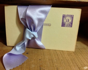 25 yard roll of light lavender reversible satin ribbon