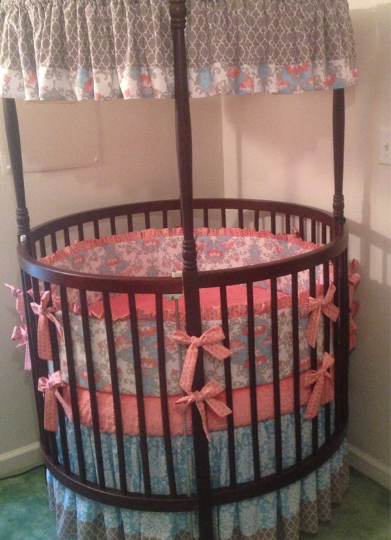 https://www.etsy.com/listing/203038259/round-crib-bedding-set-aqua-coral-and?ref=sr_gallery_36&ga_search_query=round+crib+bedding&ga_page=1&ga_search_type=all&ga_view_type=gallery