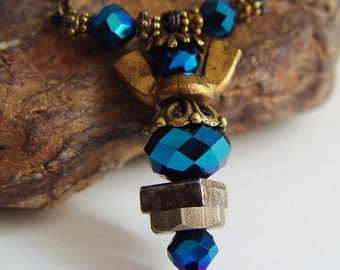 Antique Bronze and Deep Reflective Blue Beaded Wing Nut Angel Necklace