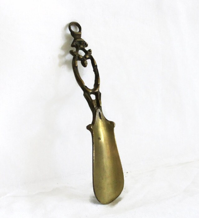 Shoe horn ornate vintage brass shoehorn. Old patina