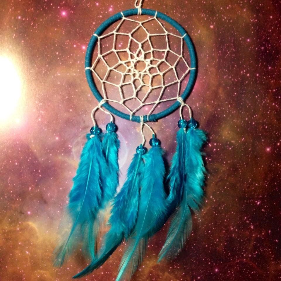 Blue dream catcher faux suede blue feathers white web and