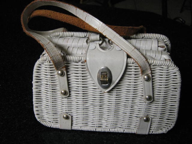 straw and white leather handbags