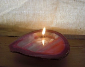 Beautiful pink agate made into a rock candle.
