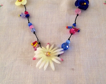 pink and blue bead and flower necklace