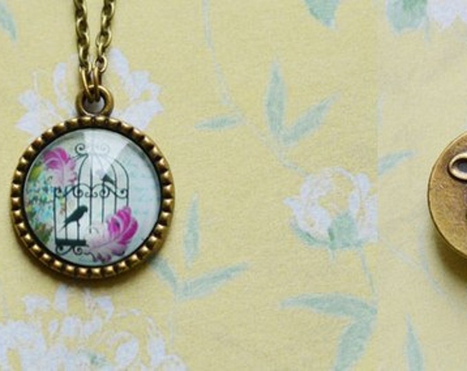 Shabby chic Round pendant with the image of glass and brass with a chain retro and vintage antique bronze color