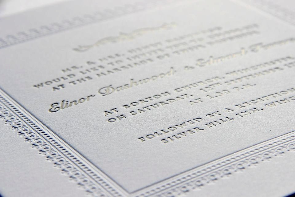 Simple White Embossed Letterpress Wedding Invitation With