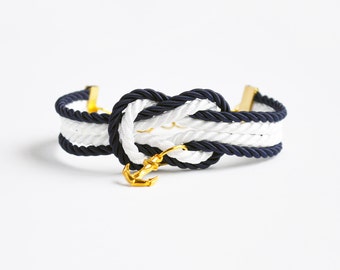 Navy blue and white forever knot nautical rope bracelet with gold anchor and ship wheel charms // adjustable nautical bracelet