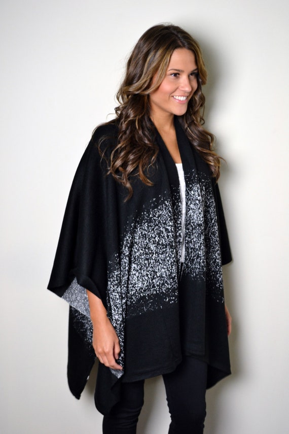 black ponchos and wraps